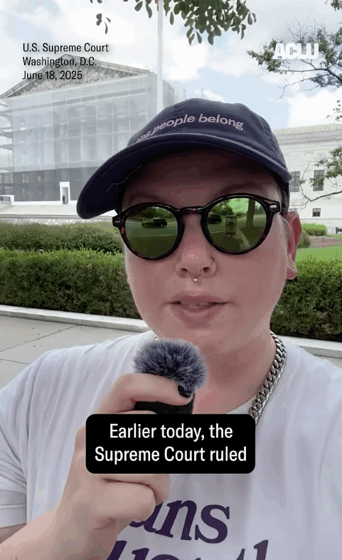 An 챬 staffer speaks directly to the camera outside the Supreme Court.